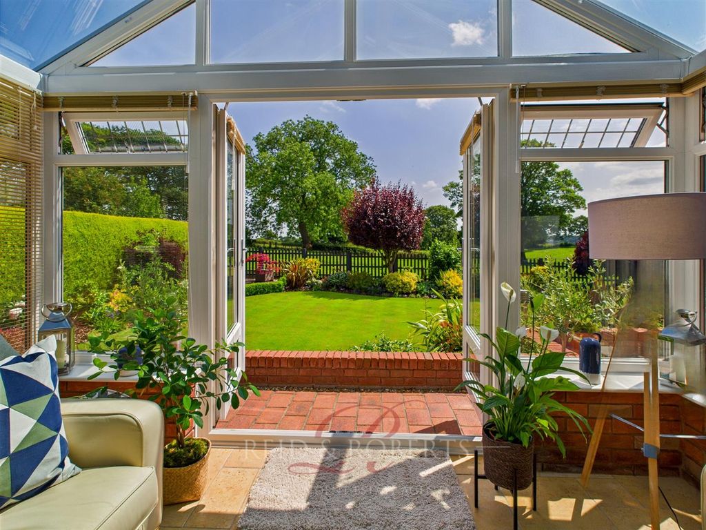 Property photo 3 of 38 Conservatory