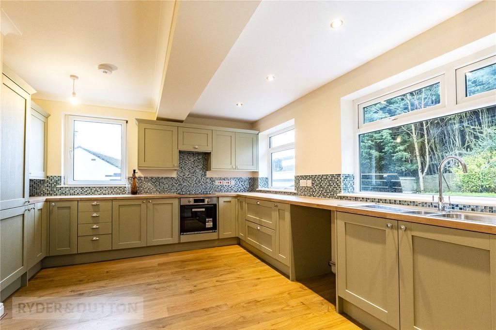 Property photo 3 of 16 Dining Kitchen