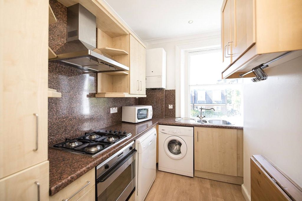Property photo 3 of 9 Kitchen