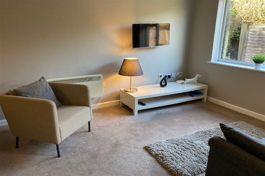 Property photo 2 of 7 Living Area