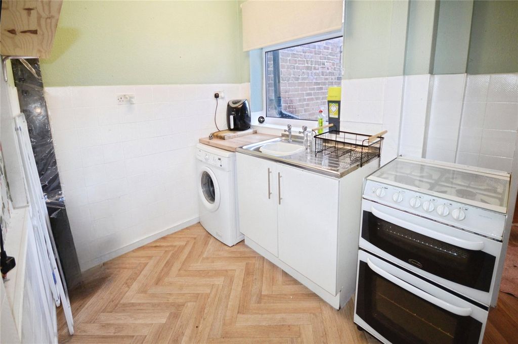 Property photo 3 of 13 Kitchen