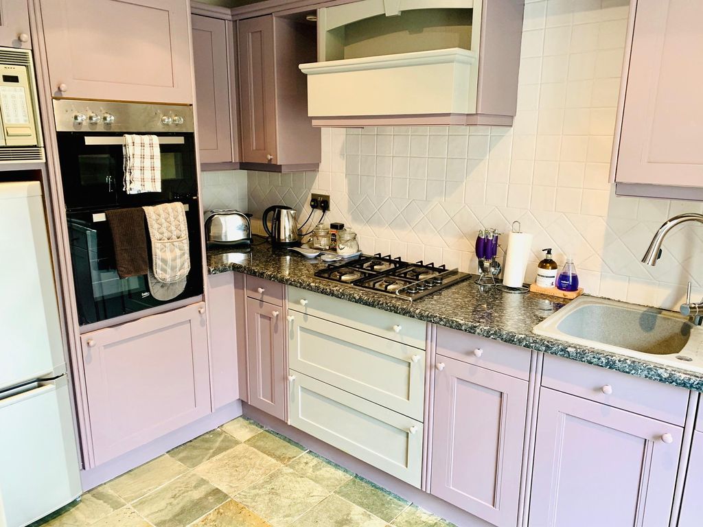 Property photo 2 of 12 Kitchen