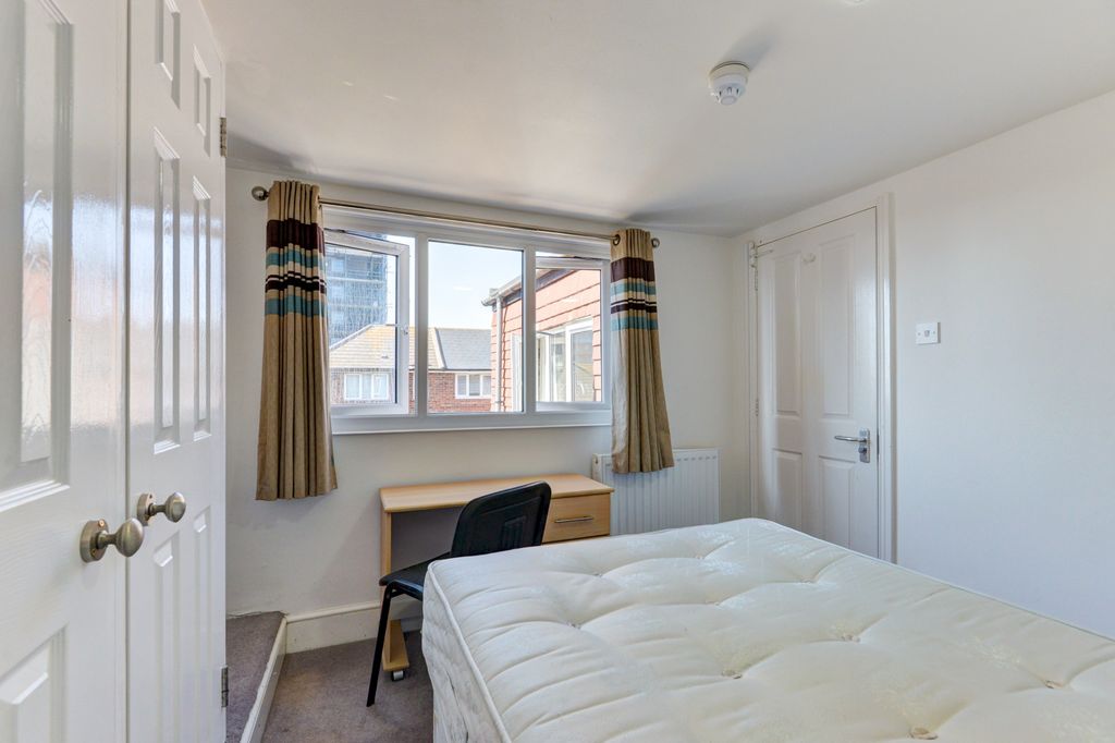 Property photo 1 of 26 Bright And Inviting Master Bedroom Featuring A Lar...