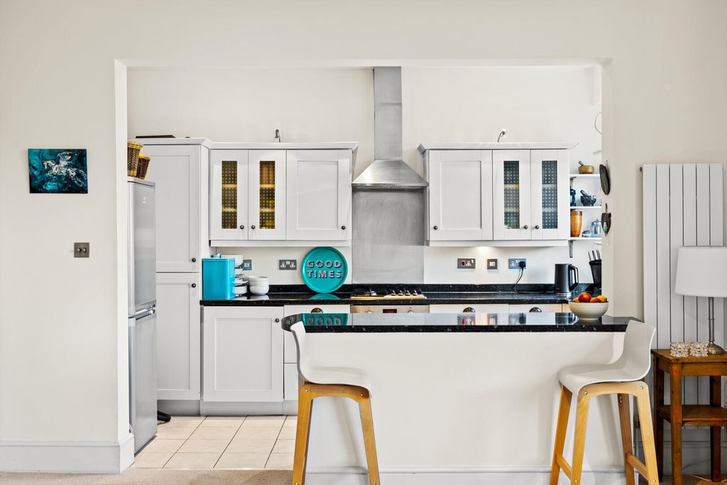 Property photo 3 of 12 Kitchen