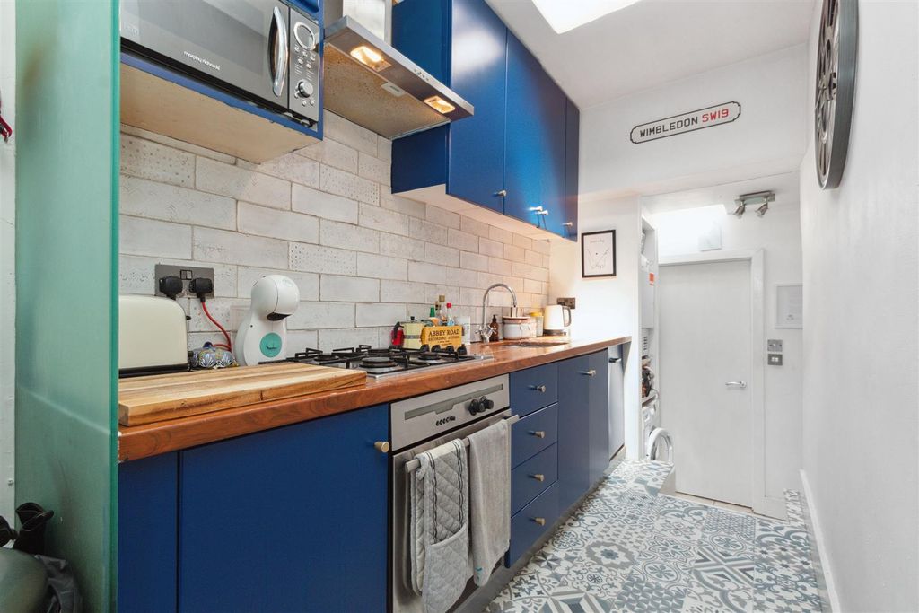 Property photo 2 of 7 Kingston Road Sw19 Kitchen
