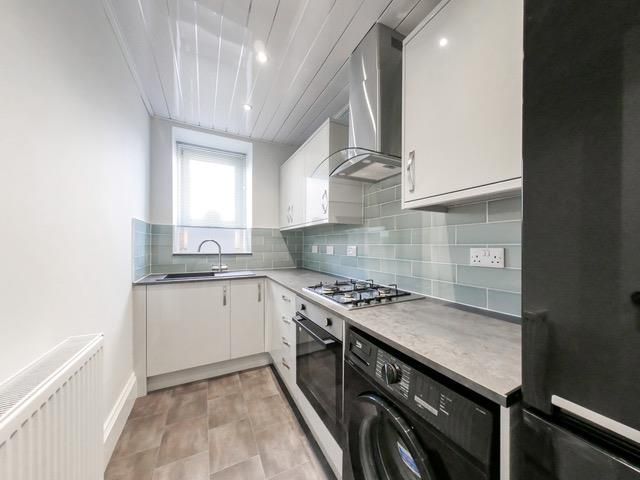 Property photo 3 of 12 Kitchen
