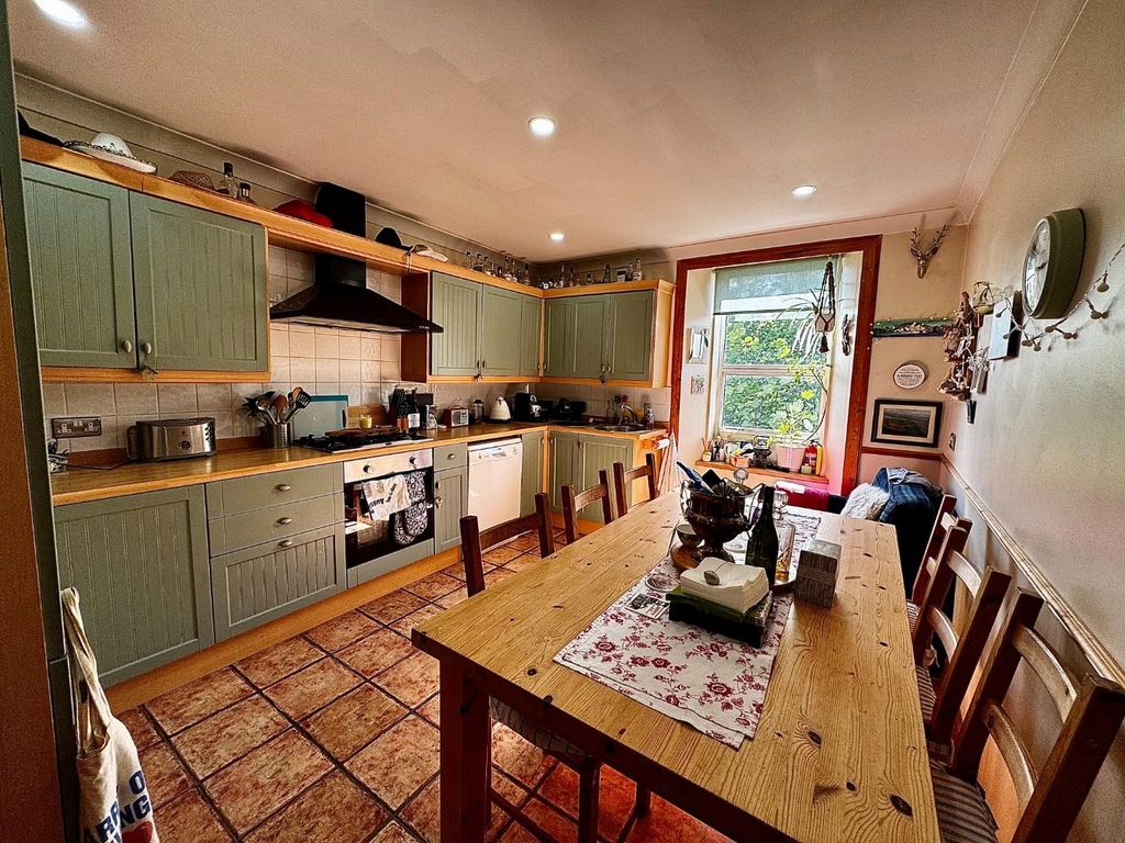 Property photo 2 of 32 Dining Kitchen
