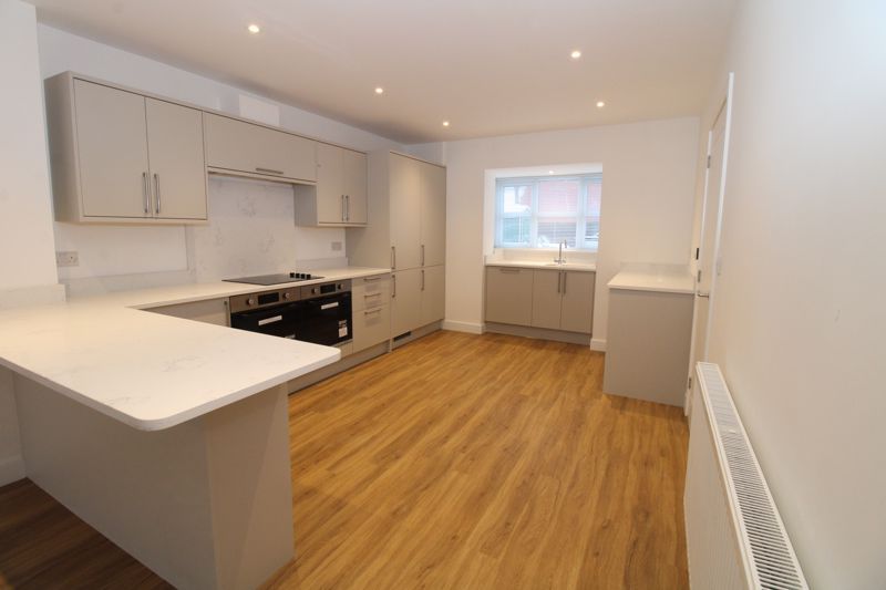 Property photo 2 of 14 Kitchen Area