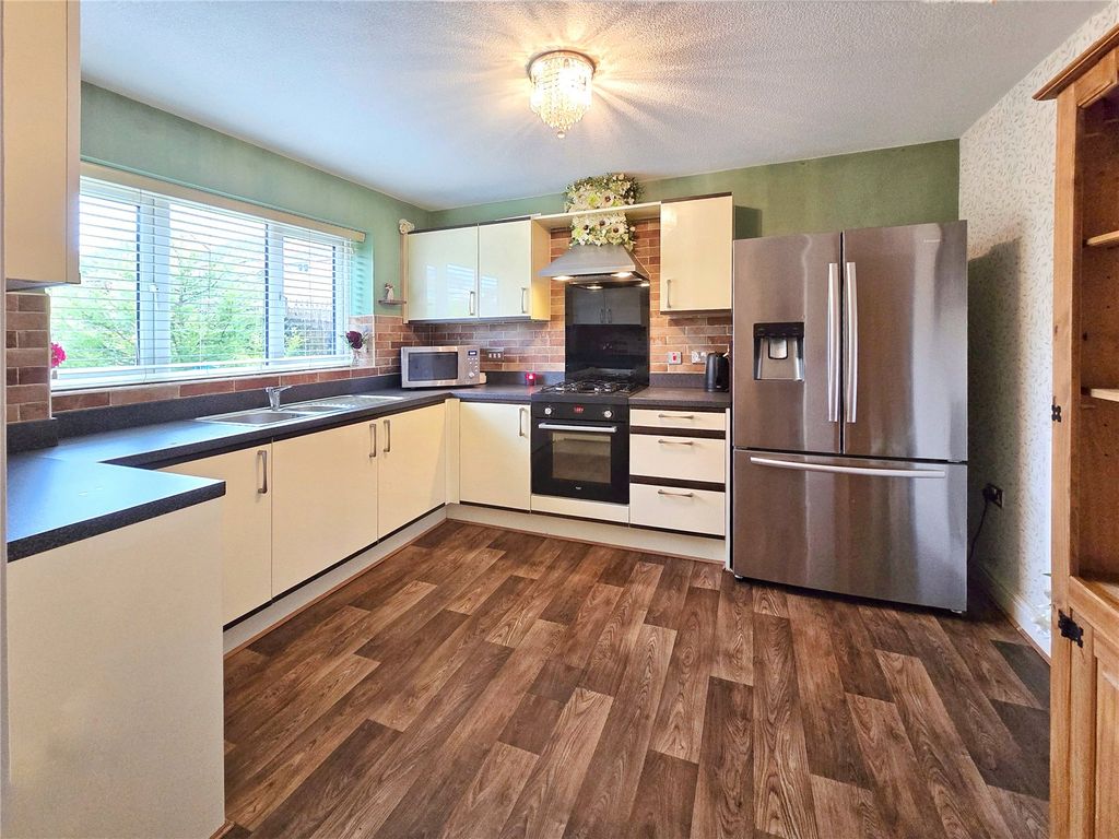 Property photo 3 of 19 Large Modern Kitchen