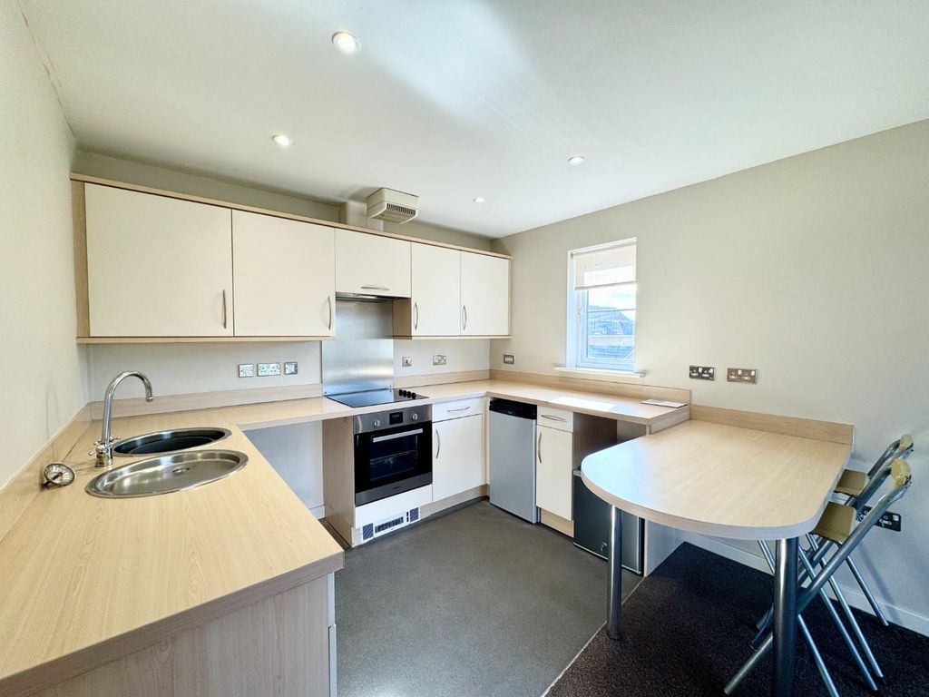 Property photo 2 of 8 Kitchen