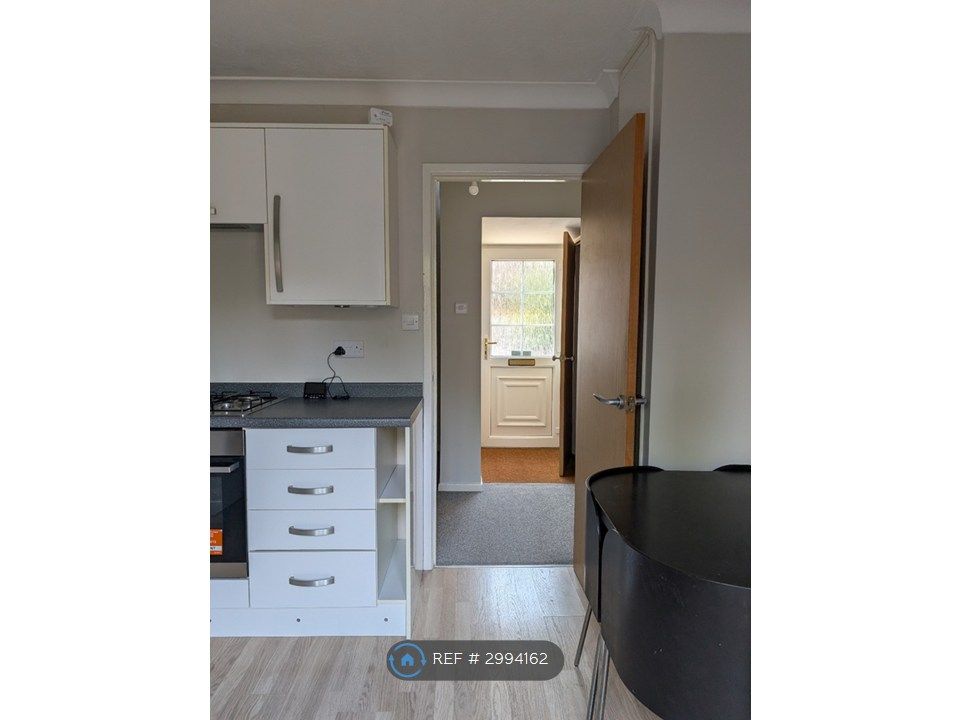 Property photo 3 of 19 Kitchen Into Hallway