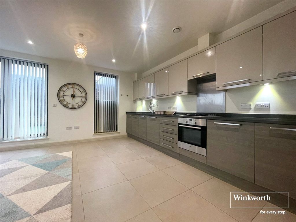 Property photo 2 of 10 Kitchen Area