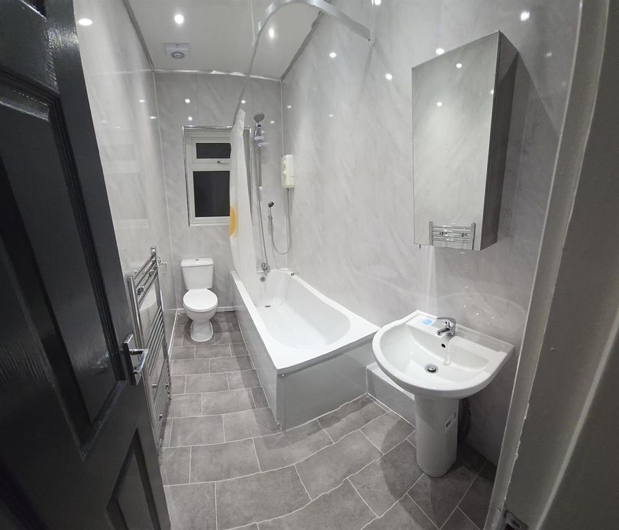 Property photo 1 of 10 Modern Bathroom Suite With Sleek Marble-Effect...