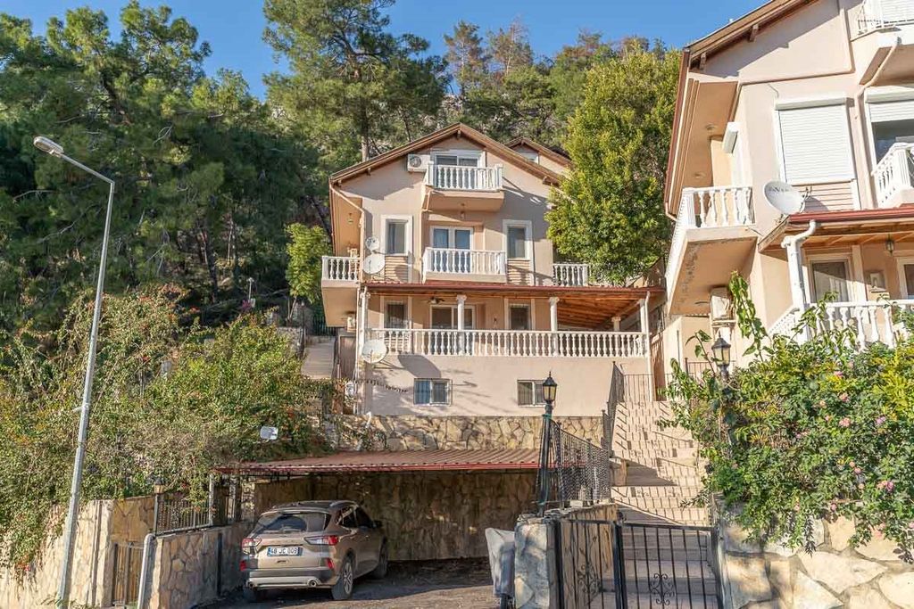 Property photo 2 of 21 A Minimalistic Attic Duplex Apartment In Gocek For Sale - Desirable Roof Duplex With Car Parking And Set On The Hillside