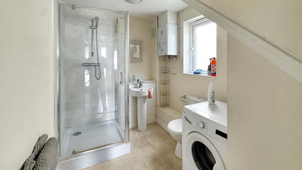 Property photo 2 of 8 A Bright And Clean Bathroom Featuring A Large Show...