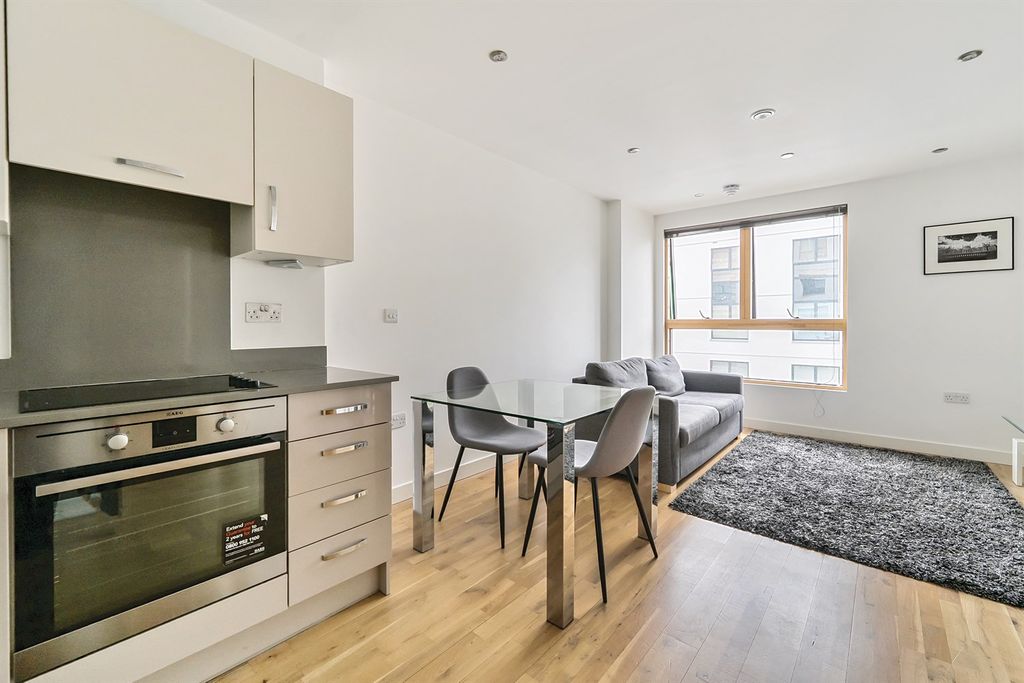 Property photo 2 of 9 Living Area