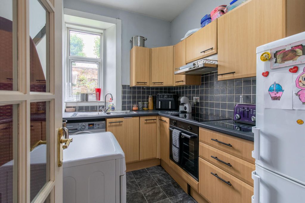 Property photo 3 of 13 Kitchen