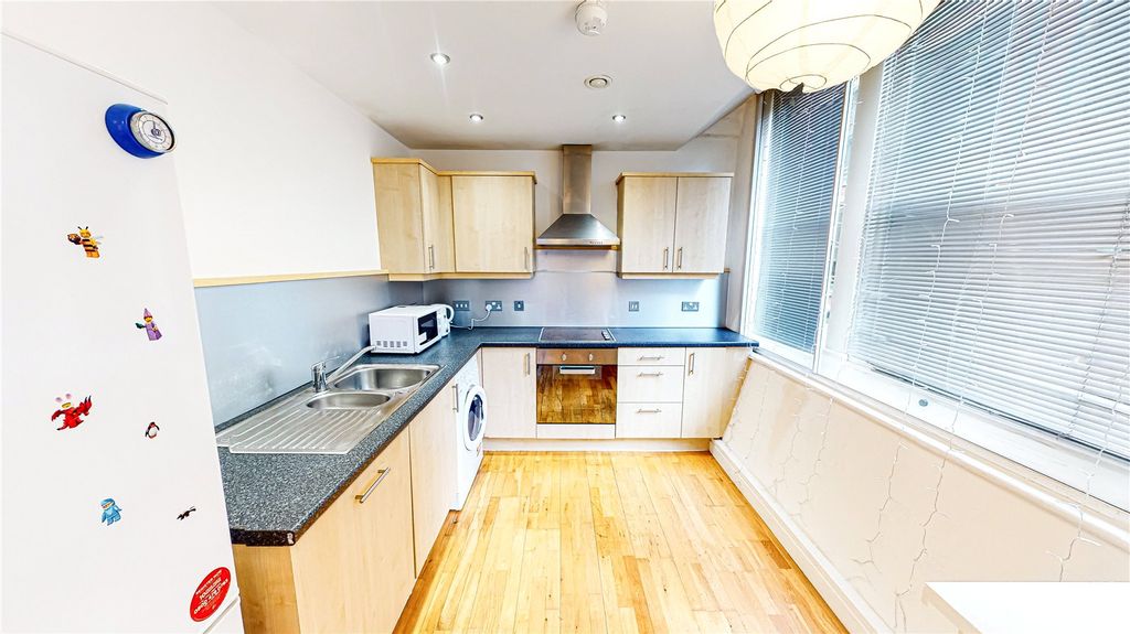 Property photo 3 of 6 Kitchen