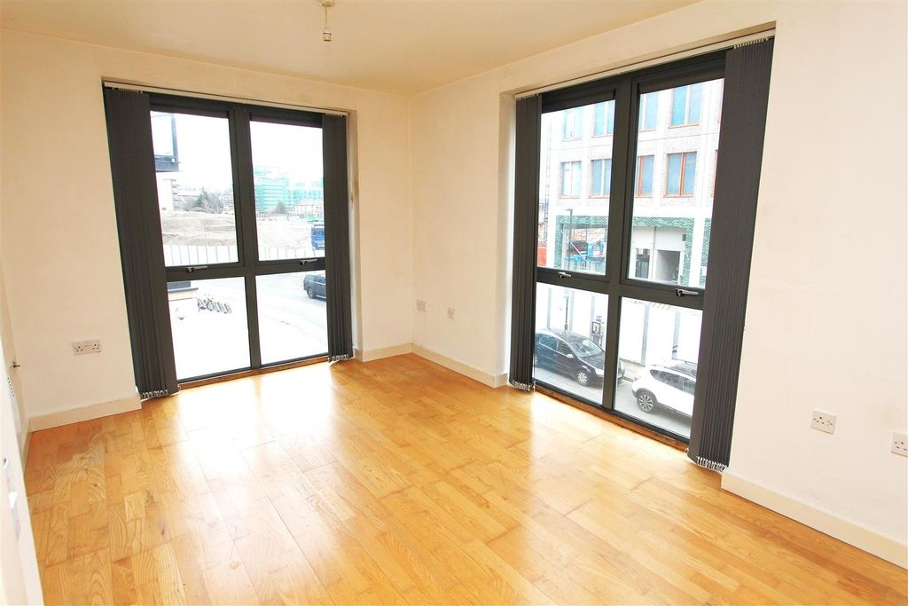 Property photo 2 of 7 Bright Living Room With Floor-To-Ceiling Windows...