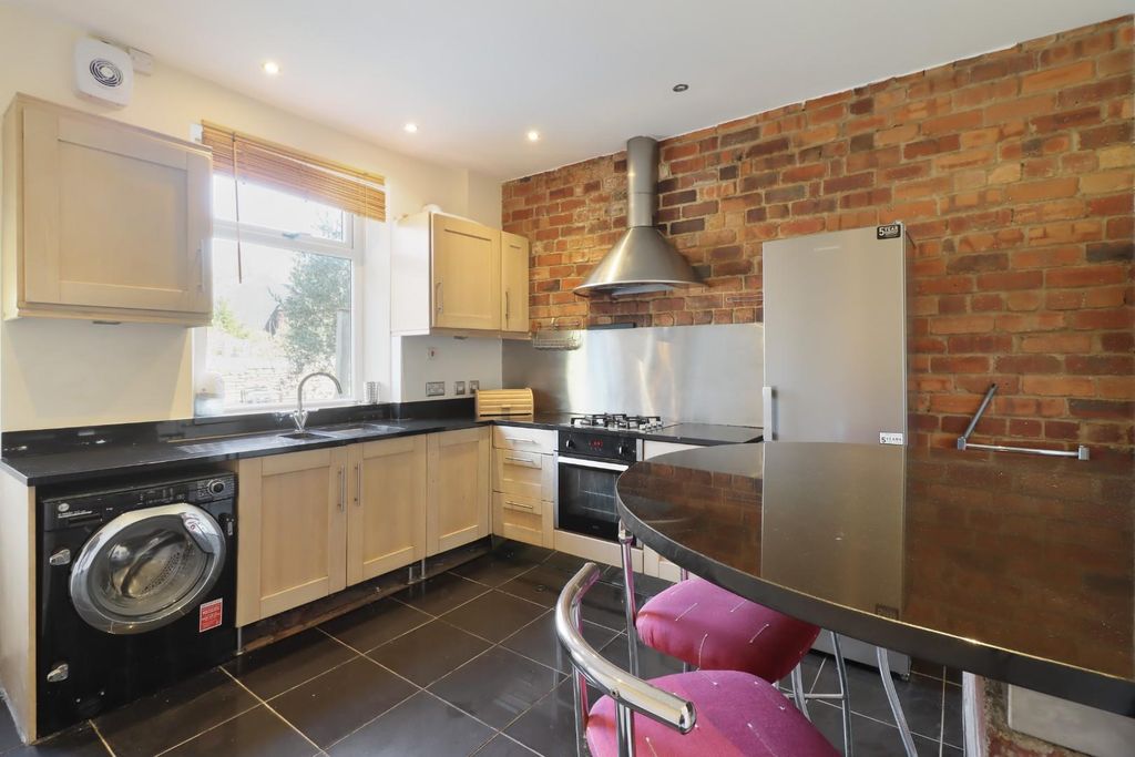 Property photo 3 of 16 Kitchen
