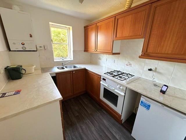 Property photo 3 of 12 Kitchen