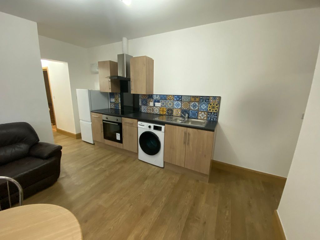 Property photo 3 of 7 Kitchen Area