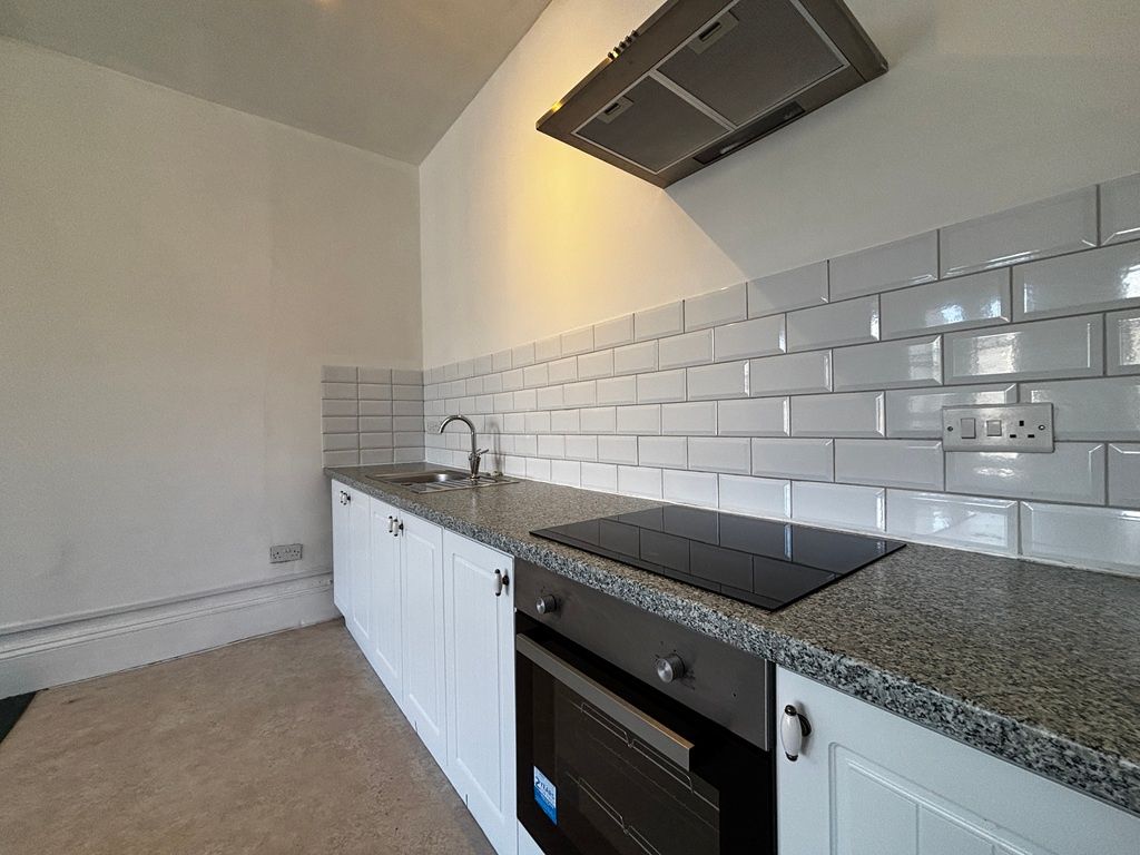 Property photo 2 of 8 Modern Kitchen With Sleek Subway Tiles...