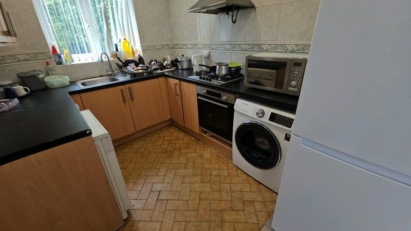 Property photo 3 of 9 Bright Kitchen With Modern Laundry Facilities...