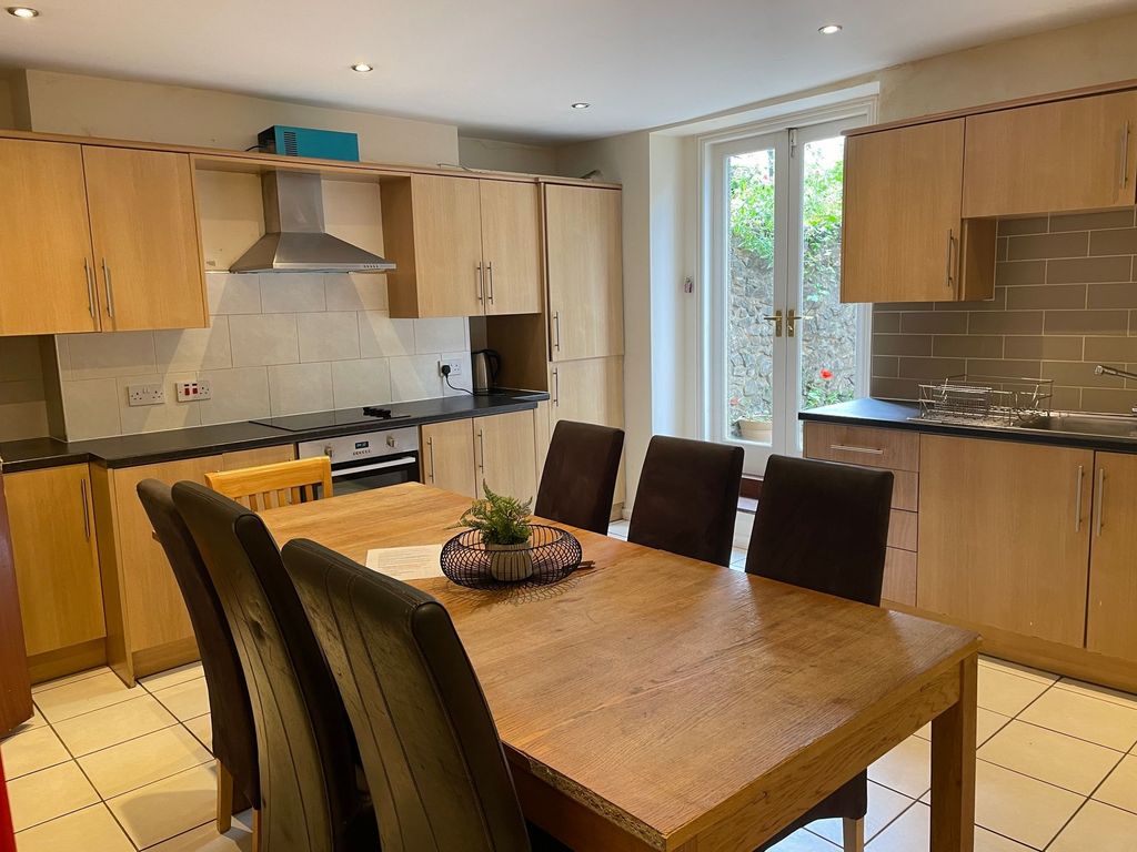 Property photo 2 of 6 Bright Modern Kitchen With Wooden Cabinets, Dark c...