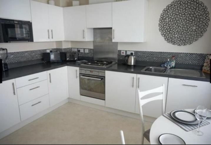 Property photo 3 of 8 Kitchen