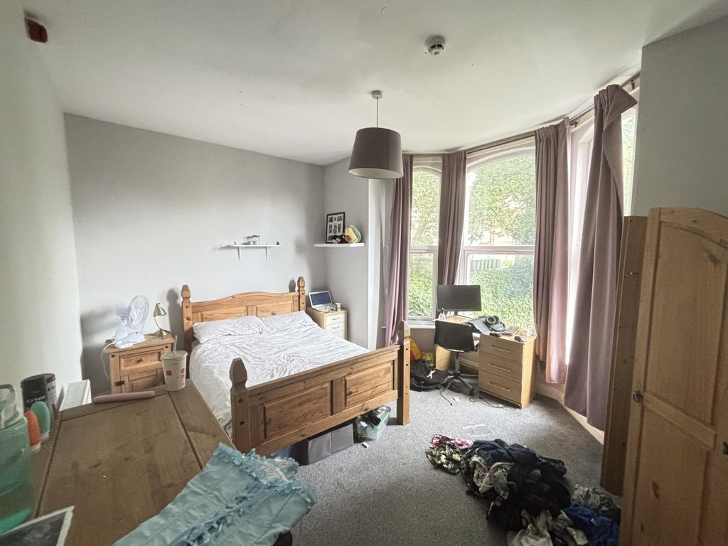 Property photo 1 of 16 A Bright And Inviting Master Bedroom Featuring A W...