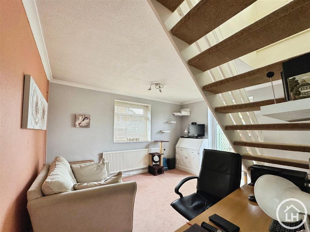 Property photo 3 of 16 Family Room