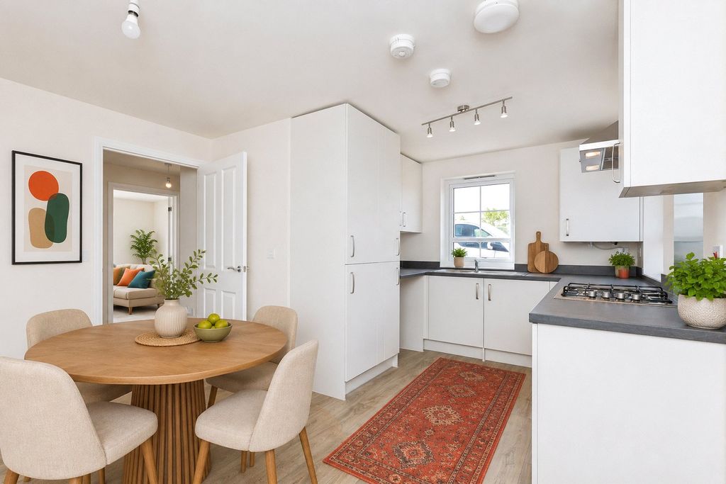 Property photo 3 of 8 Typical Kitchen