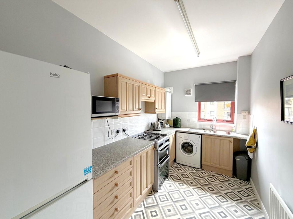 Property photo 3 of 8 Kitchen