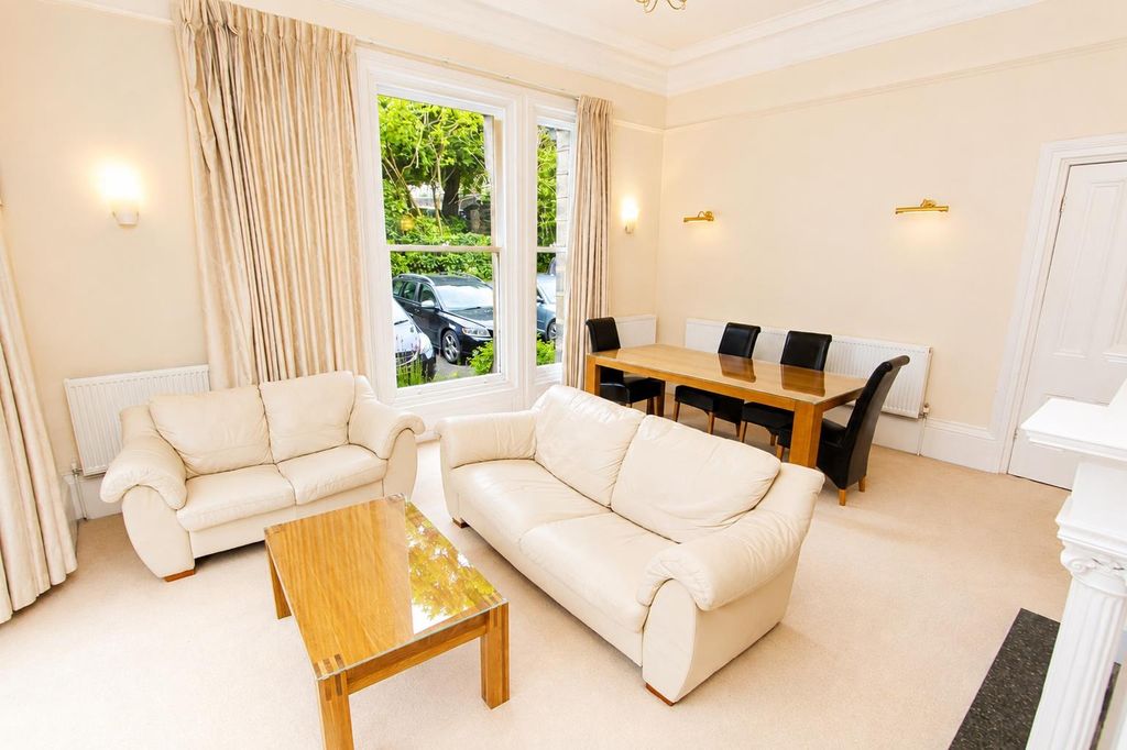 Property photo 2 of 11 Bright, Spacious Living Area With Dining Table...