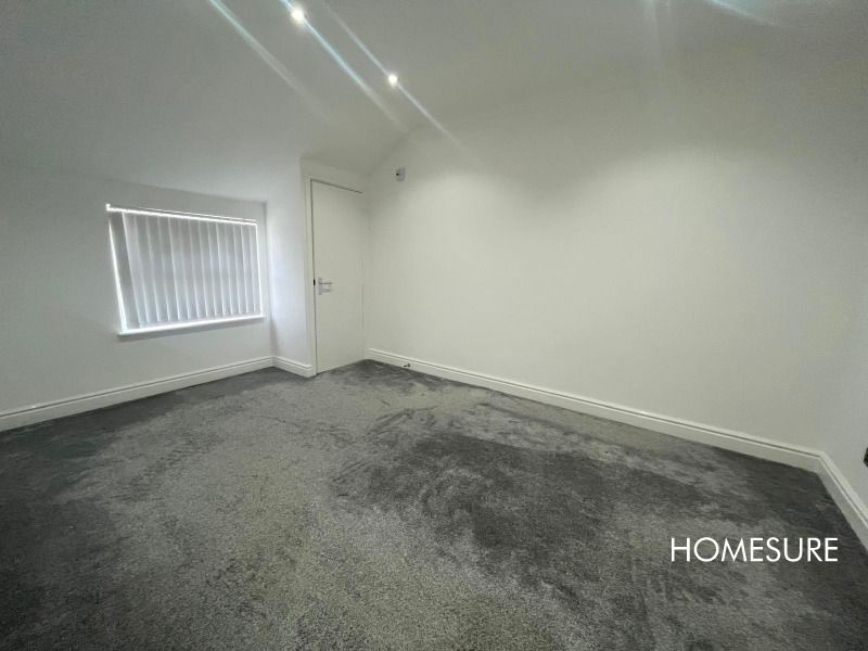 Property photo 3 of 5 Bedroom One