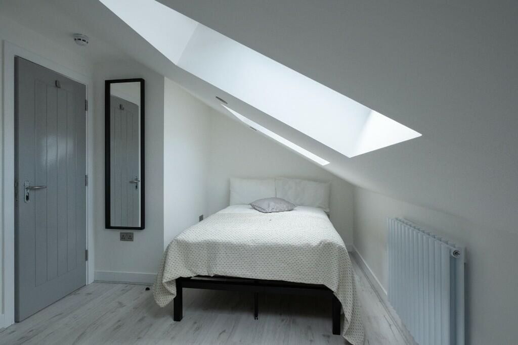 Property photo 3 of 14 This Charming Double Bedroom Features A Cozy Desig...