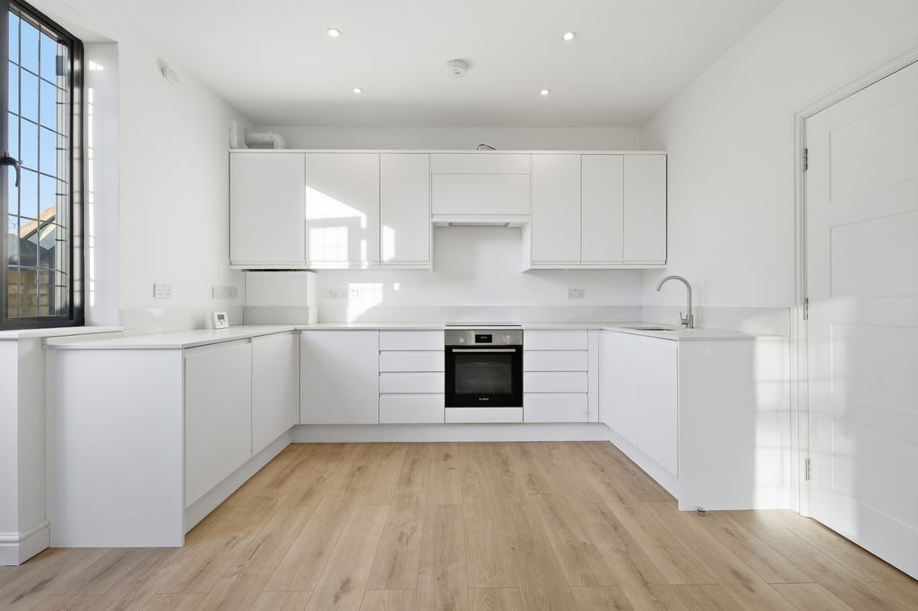 Property photo 3 of 16 Open-Plan Kitchen