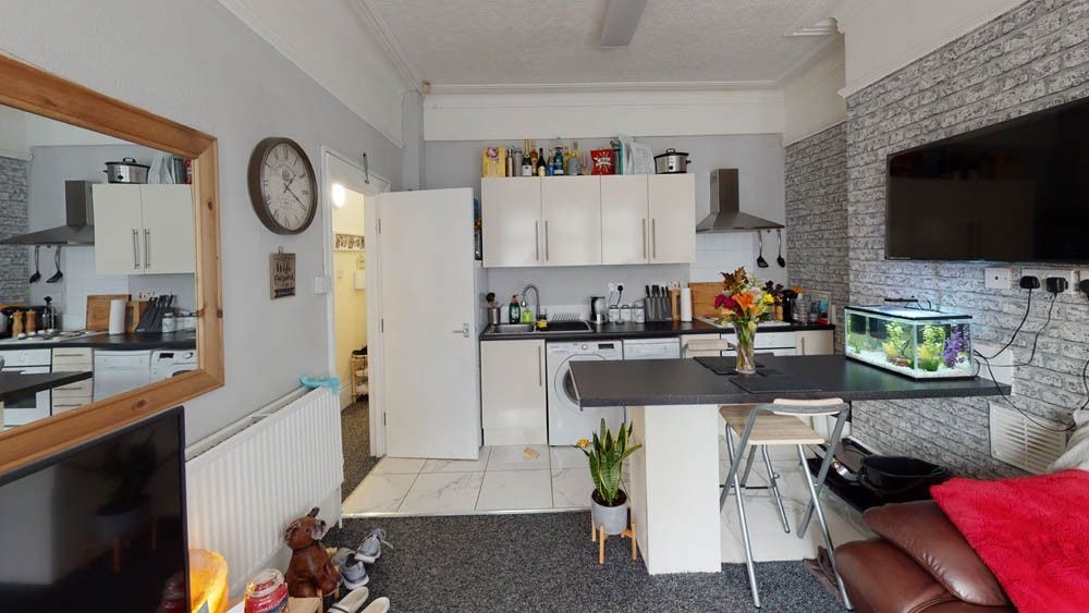 Property photo 1 of 7 A Bright And Modern Living Room Featuring Contempo...