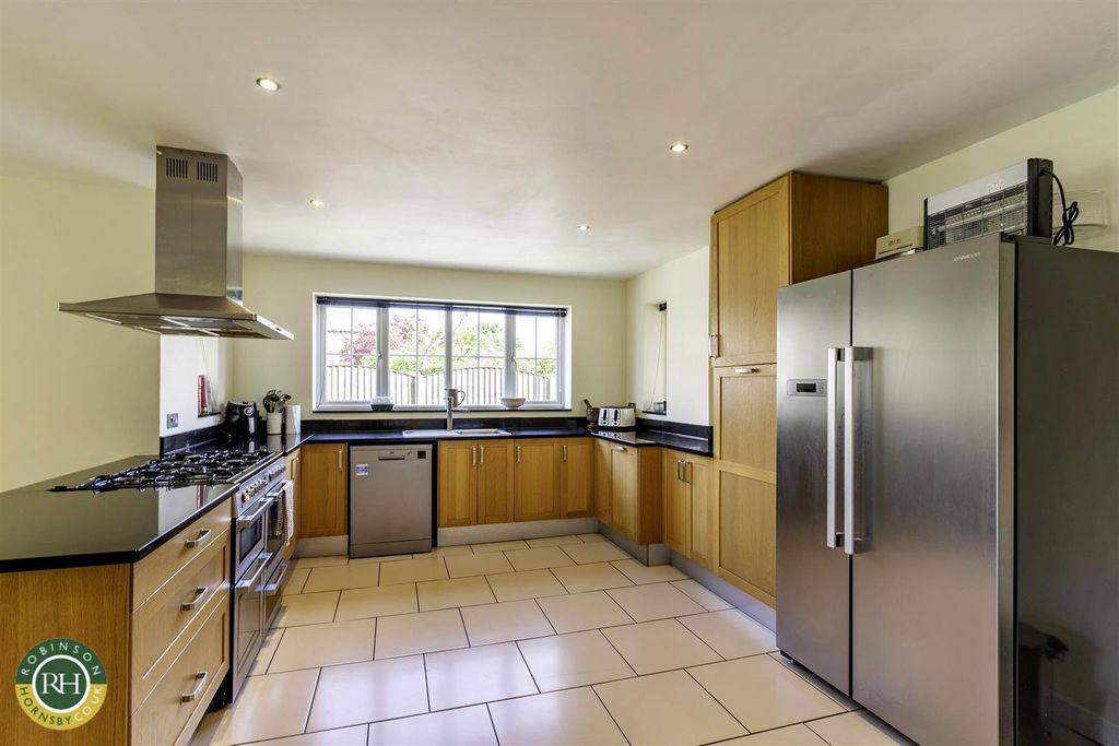 Property photo 3 of 24 Kitchen Area
