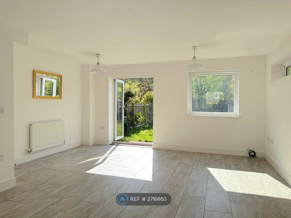 Property photo 2 of 19 Downstairs Living Area