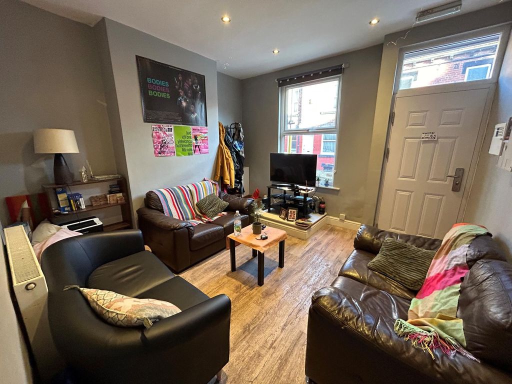 Property photo 1 of 14 A Bright And Inviting Living Room With Comfortable...