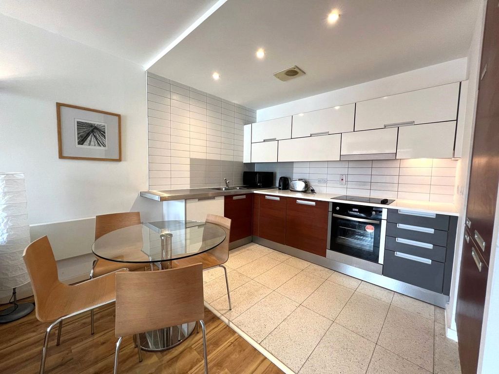 Property photo 3 of 9 Kitchen