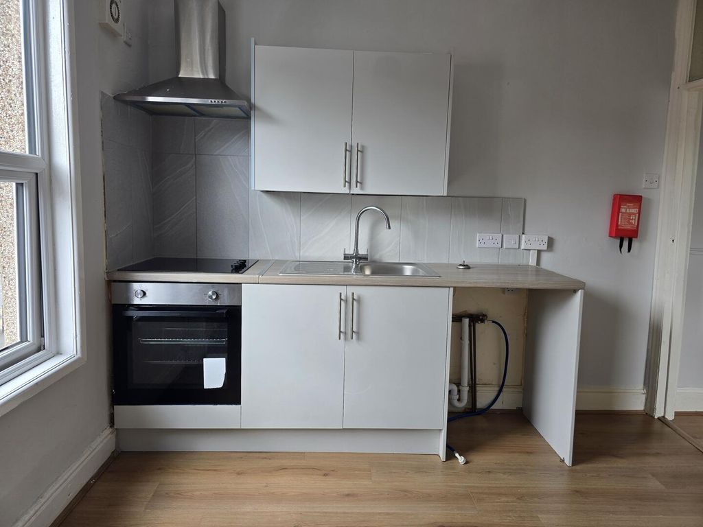 Property photo 1 of 6 Kitchen
