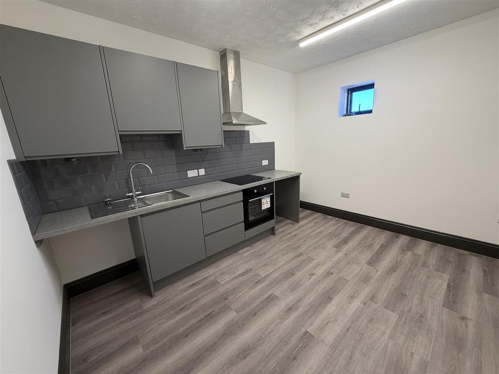 Property photo 1 of 8 Kitchen