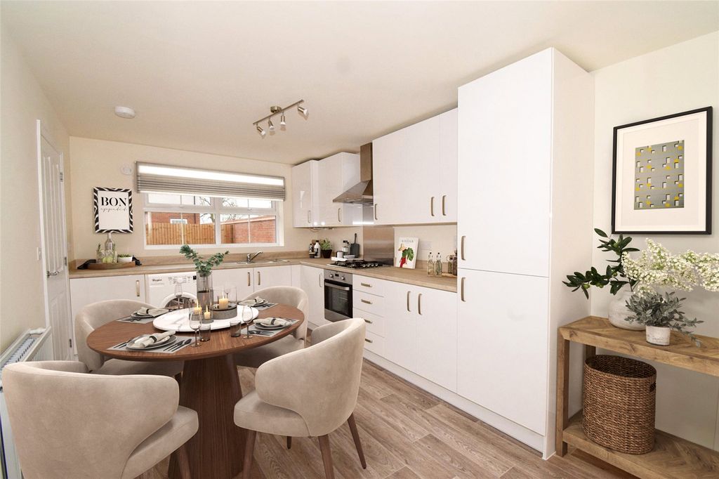 Property photo 3 of 10 Typical Kitchen