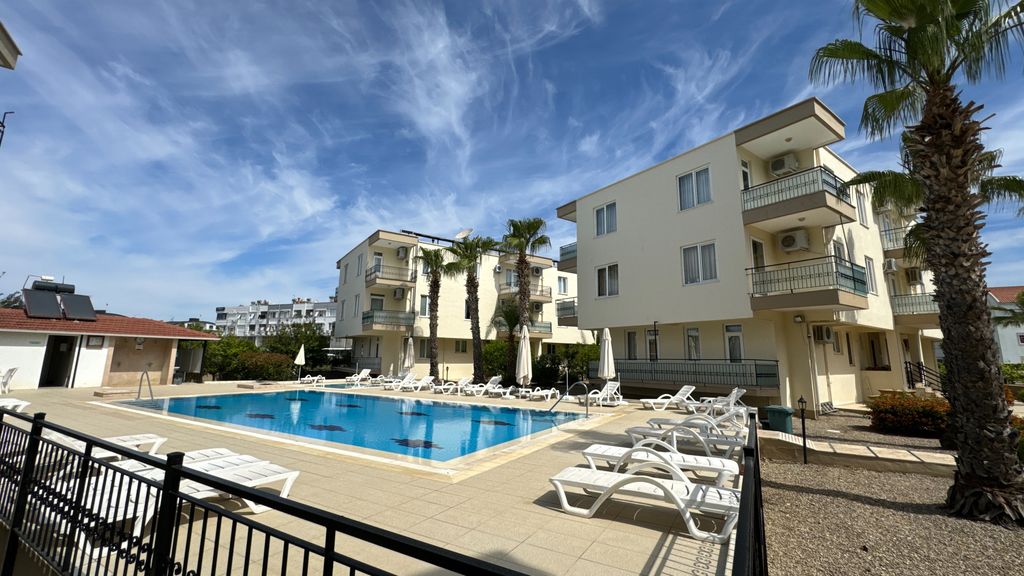 Property photo 1 of 11 A Great Located Apartment In Belek, Antalya For Sale - Main View Of The Complex And Communal Pool