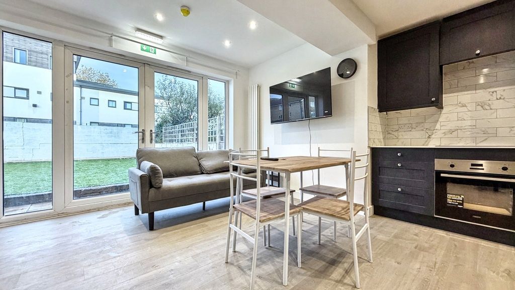 Property photo 1 of 15 Bright Open-Plan Living Area With Full-Height Glas...