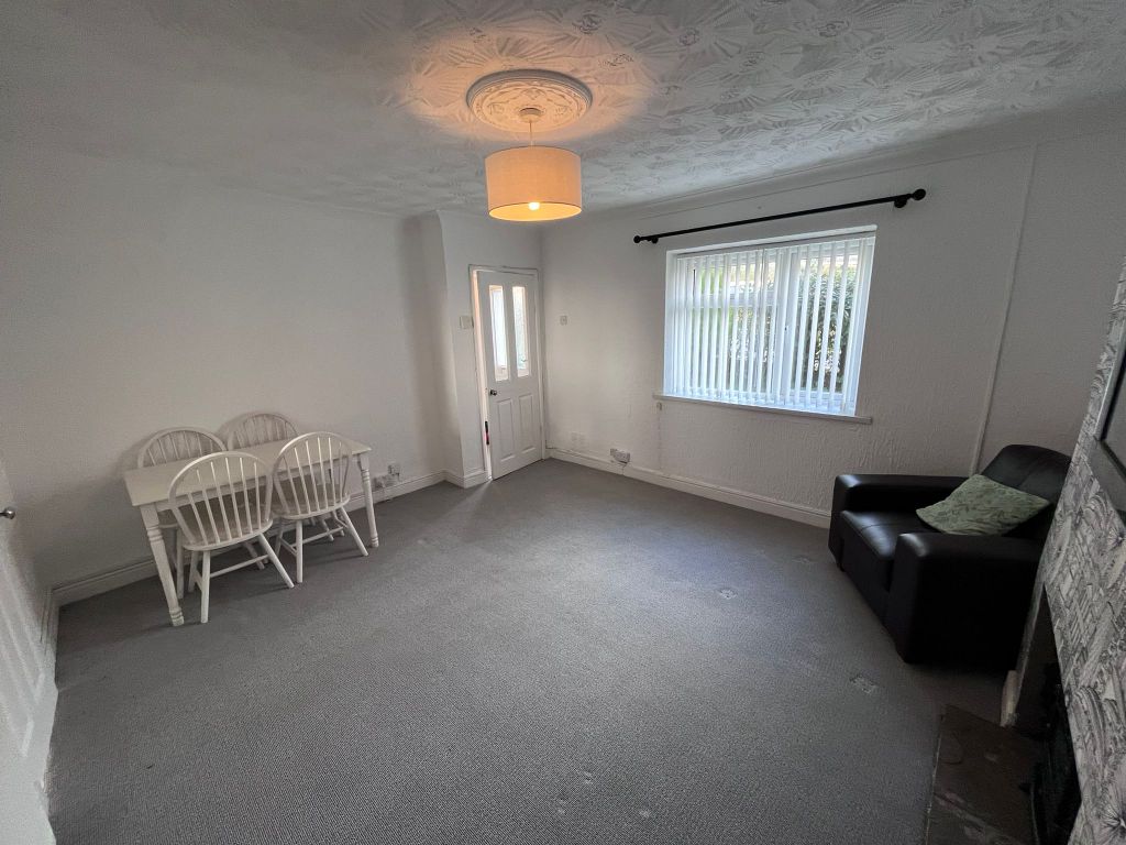 Property photo 3 of 12 Living Room