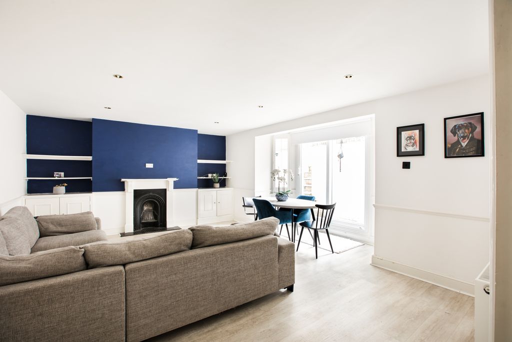 Property photo 2 of 14 Spacious Living Dining Area With Fireplace